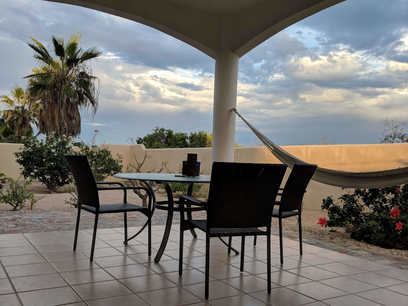 Casa j9 downstairs covered patio with a view over its north wall of the Pacific