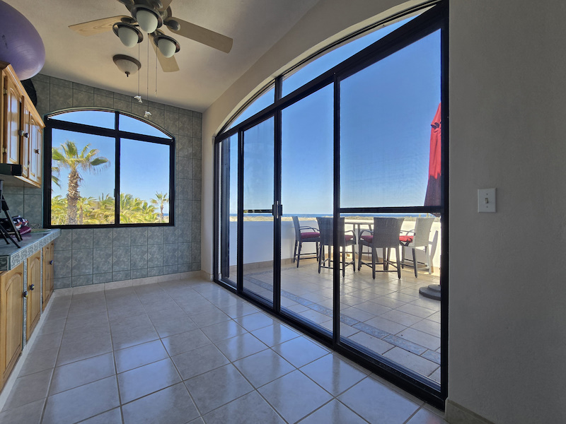 Casa j9 upstairs bonus room with sweeping views opens up to its north patio